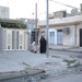 Soldiers Walk Through Al-Karama Neighborhood