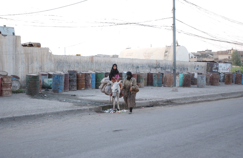 Soldiers Walk Through Al-Karama Neighborhood