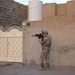 Soldiers Walk Through Al-Karama Neighborhood