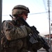 Soldiers Walk Through Al-Karama Neighborhood