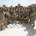 Marines swing away, with help from Seattle Mariners
