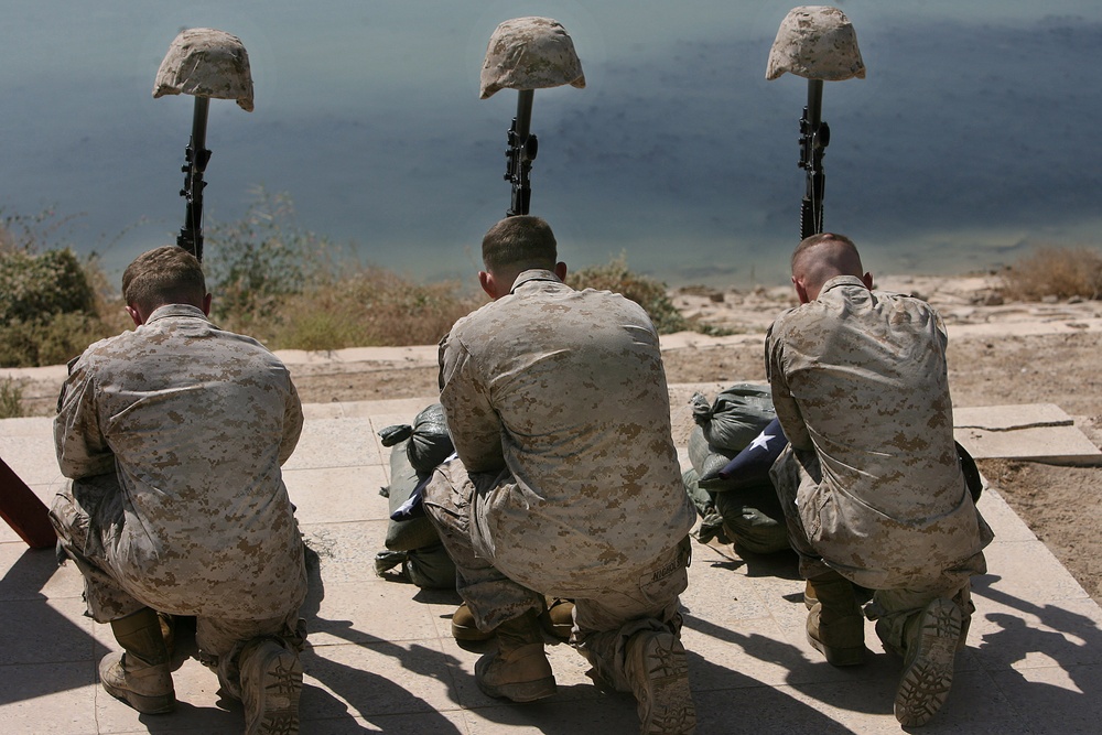 Marines pause to remember three of their own