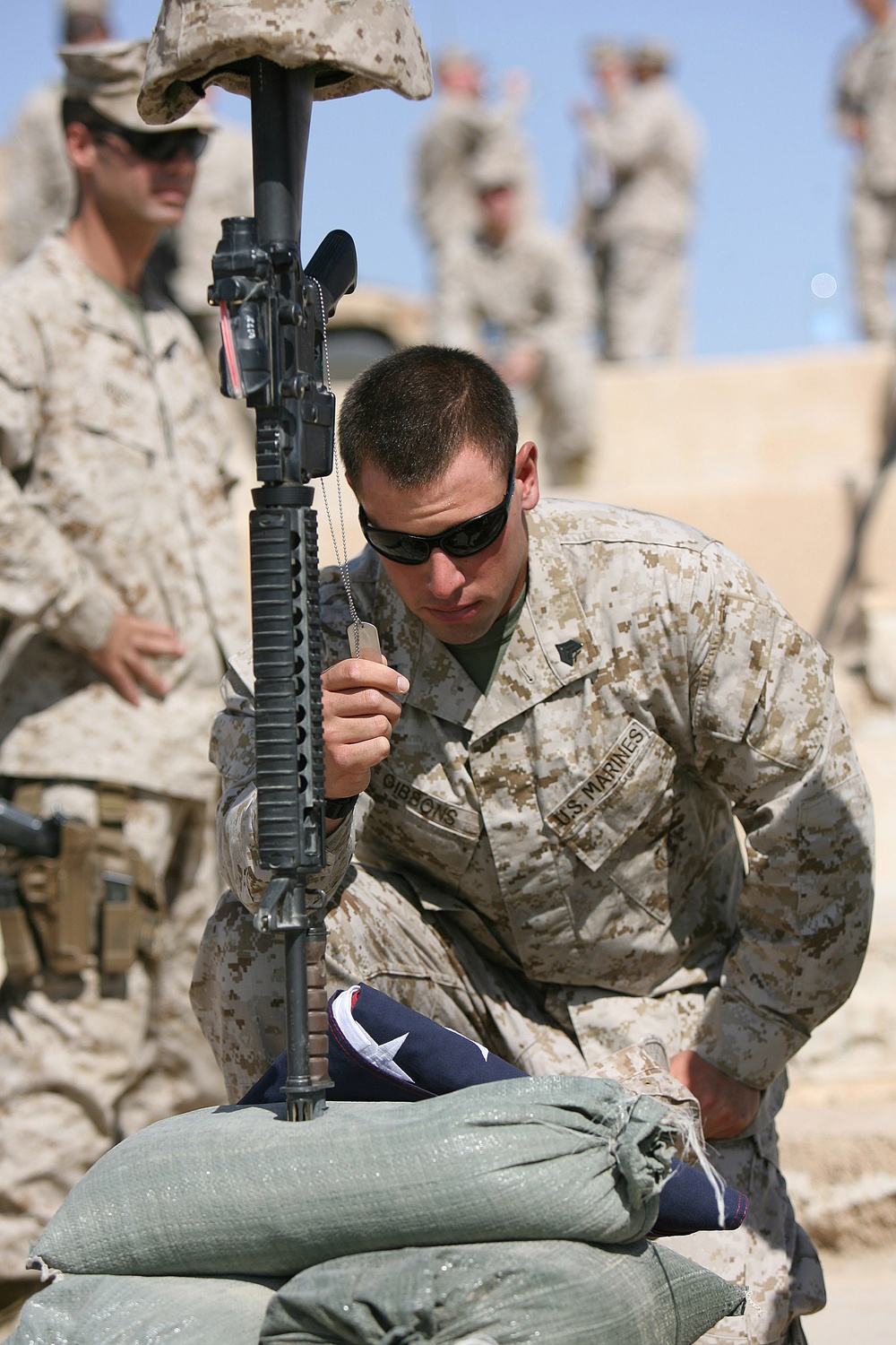 Marines pause to remember three of their own