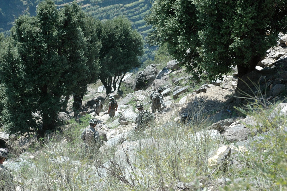 Soldiers Negotiate Mountainous Terrain on Patrol