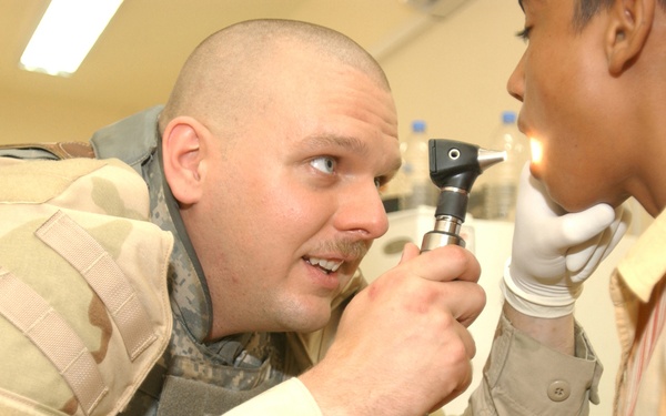 IPs, MND-B Soldiers conduct MedOp in Assyria