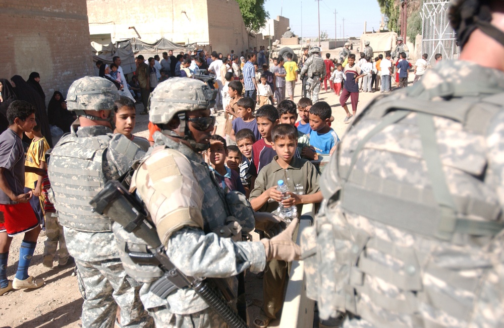 IPs, MND-B Soldiers conduct MedOp in Assyria