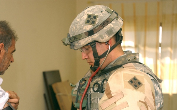 IPs, MND-B Soldiers conduct MedOp in Assyria