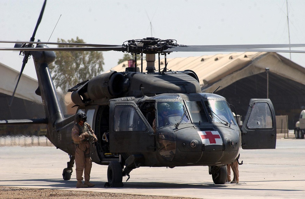 1st Cav. Div. MEDEVAC crews train with 4th Inf. Div.'s CAB to relieve Dusto