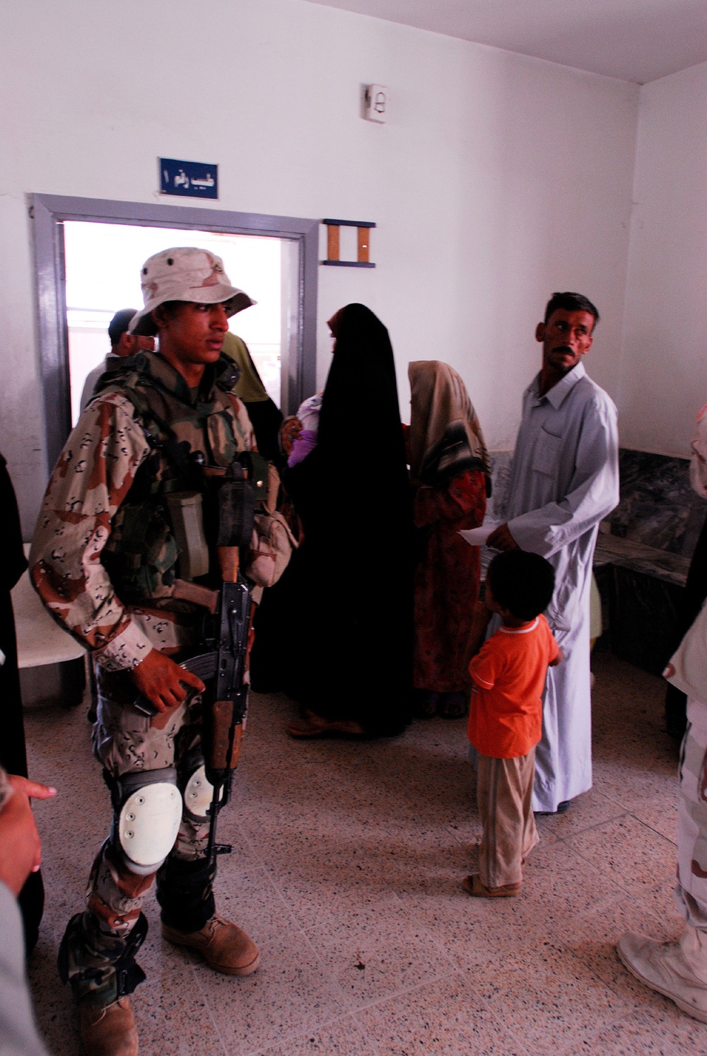 MND-B Soldiers work with the Ministry of Health to care for residents of Gh