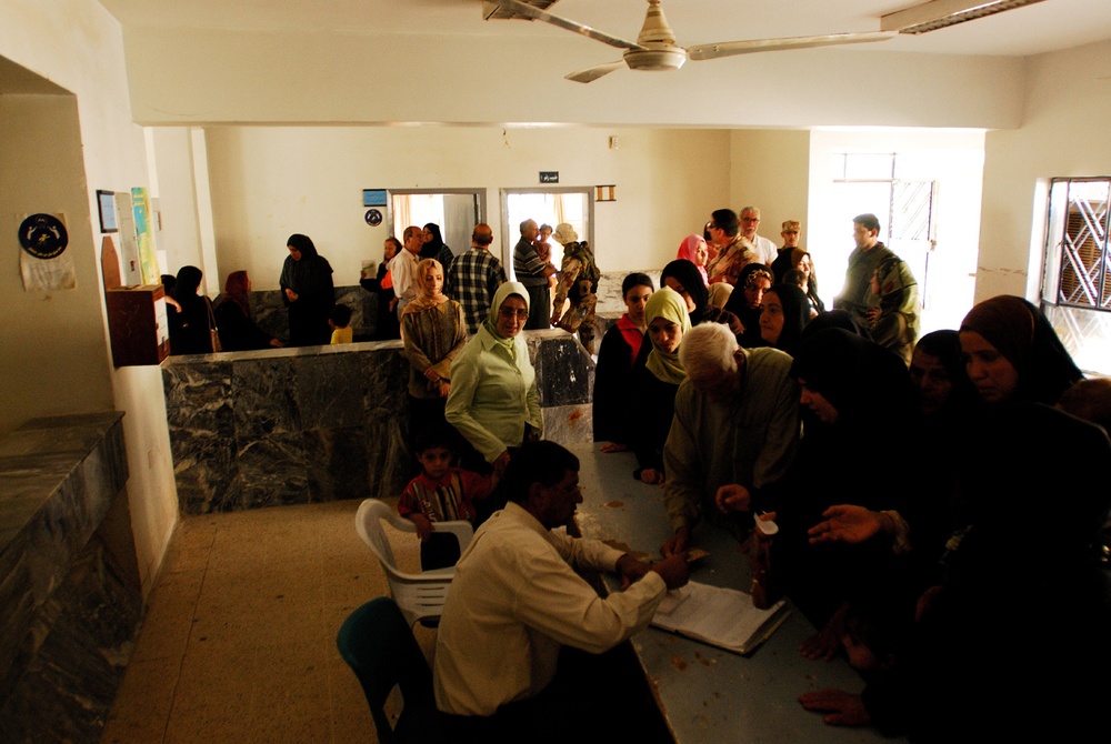 MND-B Soldiers work with the Ministry of Health to care for residents of Gh