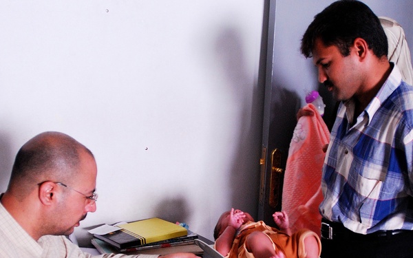 MND-B Soldiers work with the Ministry of Health to care for residents of Gh