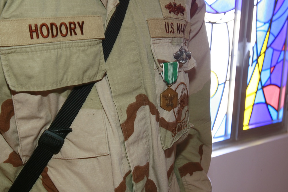 Sailor constructs stained-glass windows at Al Asad base chapel