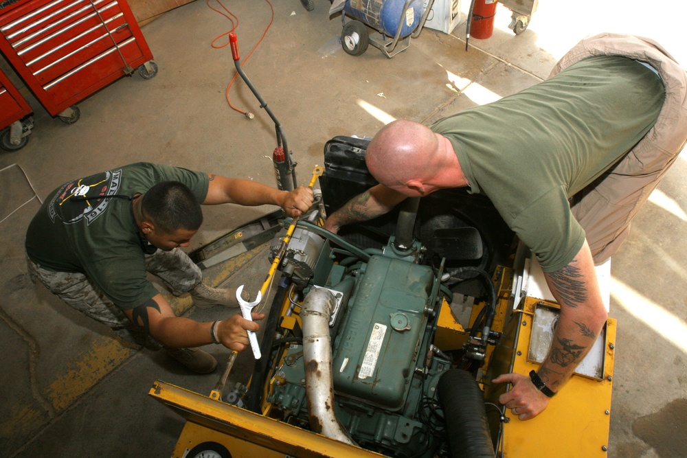 Marines tag team ground support equipment