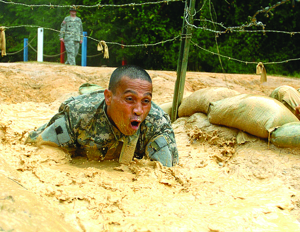 Soldiers Overcome Obsticle Course at Basic Training