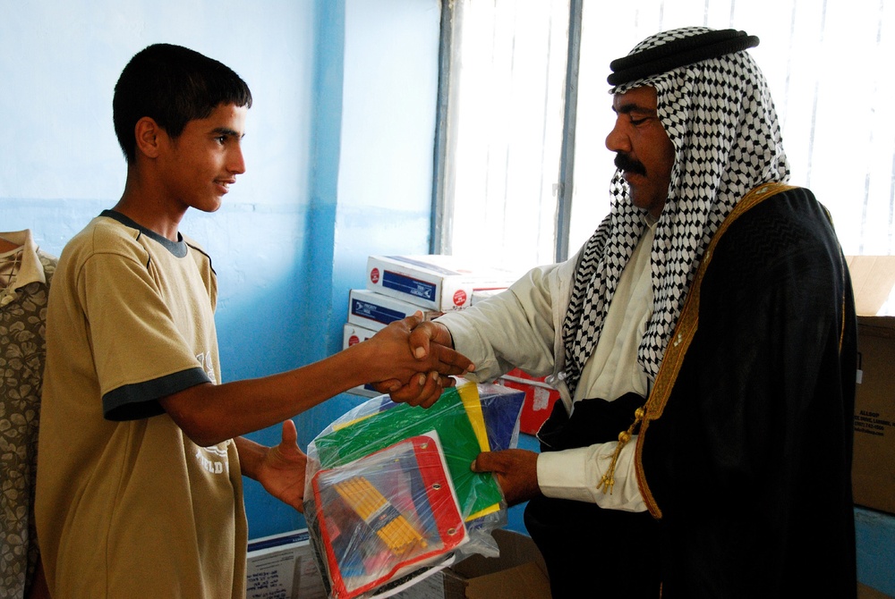 MND-B Soldiers Distribute School Supplies From Non-profit Organizations to