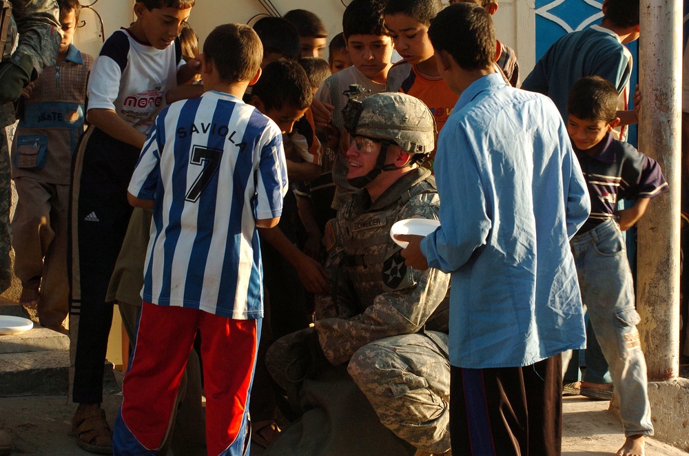 Stryker Soldiers work with Iraqi Police and security forces