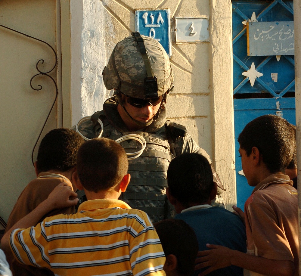 Stryker Soldiers work with Iraqi Police and security forces