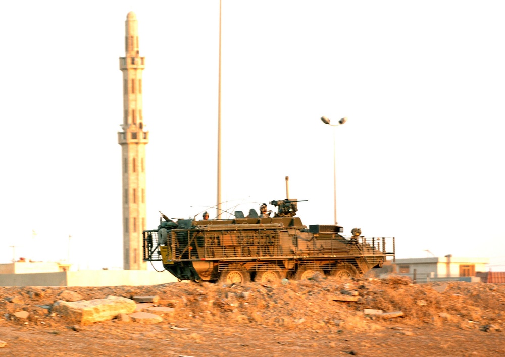 Stryker Soldiers work with Iraqi Police and security forces