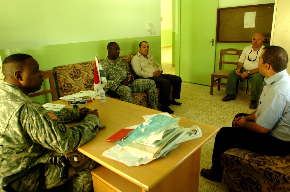 Civil Affairs Soldiers Help Students, Visit Displaced Kurds From 'Anfal' Ca