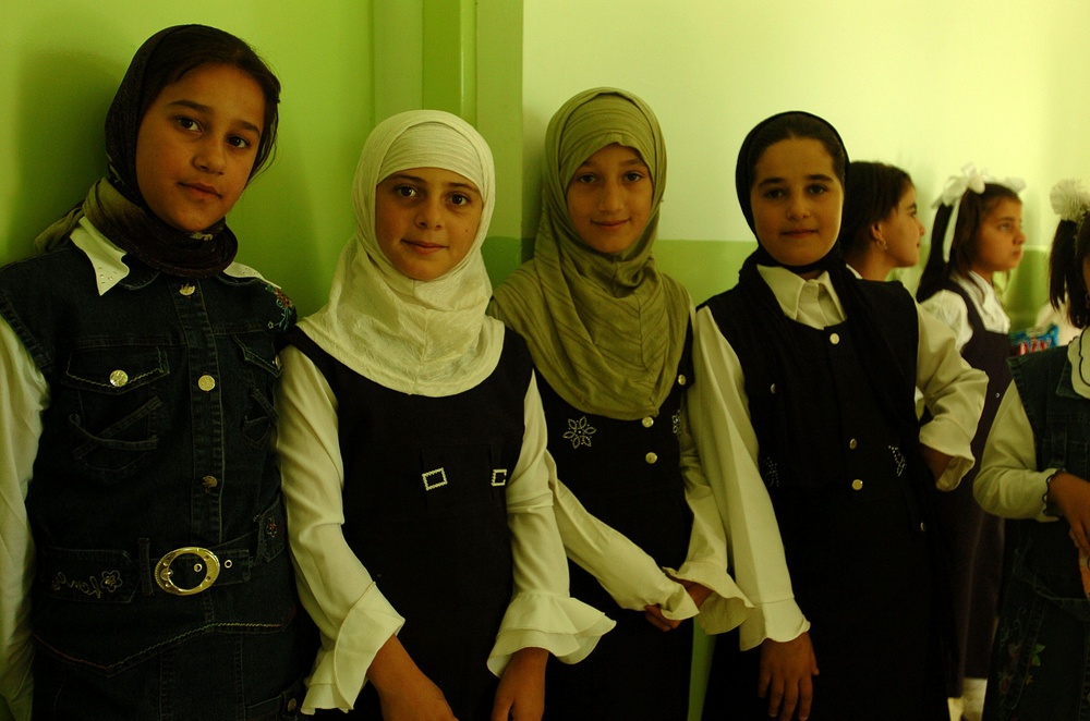Civil Affairs Soldiers Help Students, Visit Displaced Kurds From 'Anfal' Ca