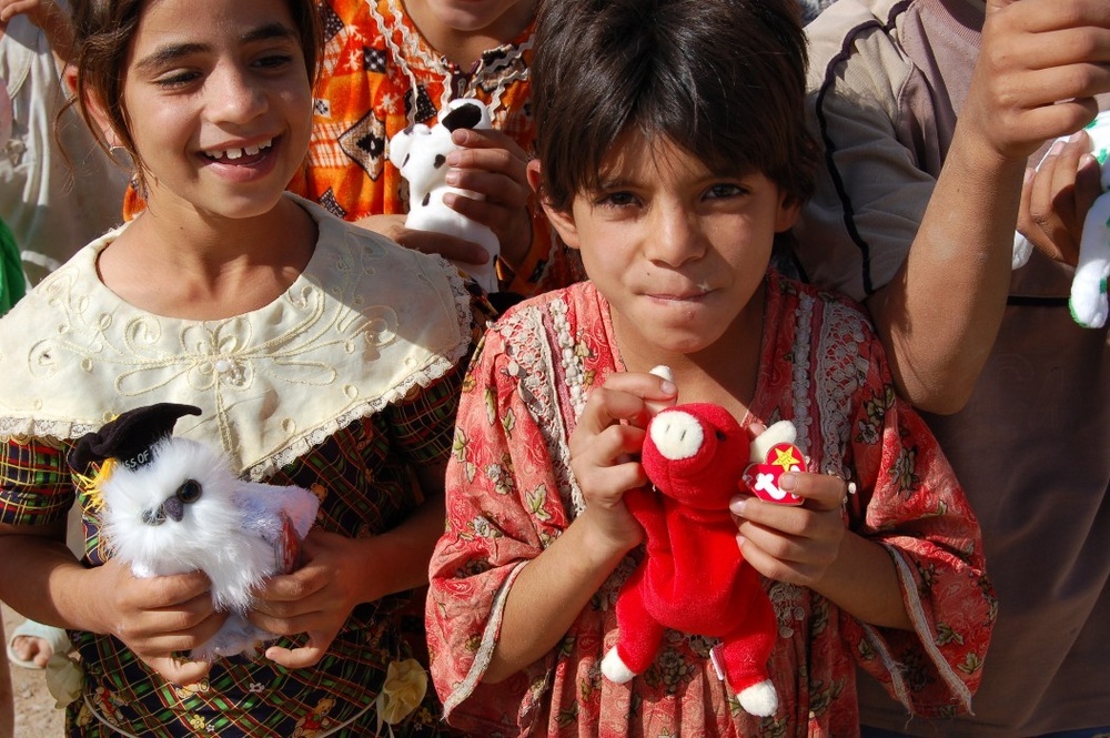 Coalition and Iraqi Forces Donate Beanie Babies to Children in Tuz, Iraq