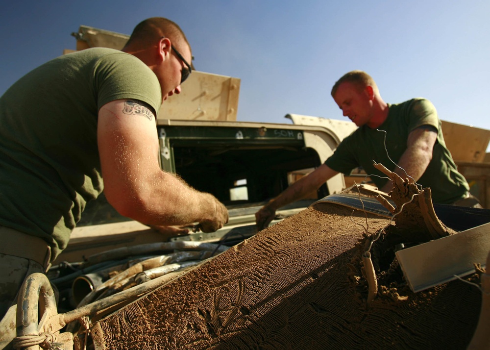 Automotive Salvage Yard Keeps Vehicles Rolling at Al Asad