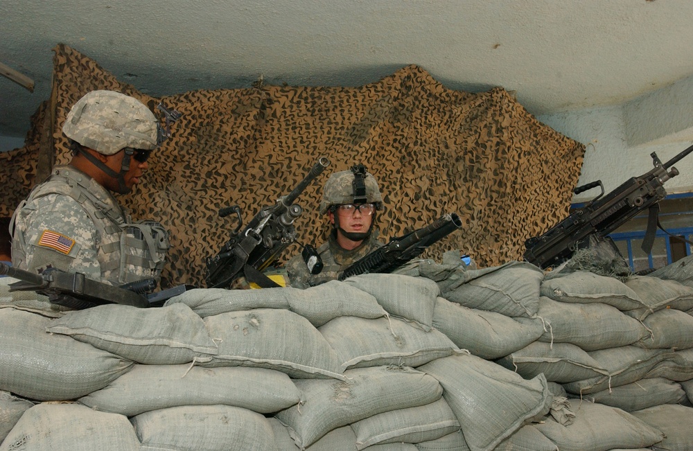 ISF, MND Soldiers work to save Saab al Bour