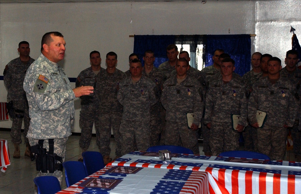 MND-B CG Awards Purple Hearts to 24 101st Abn. Div. Soldiers at FOB Falcon