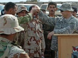 Iraqi Army brigade receives new trucks to guard infrastructure