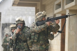 Comm Marines tackle combat course, focus on convoy operations, urban warfar