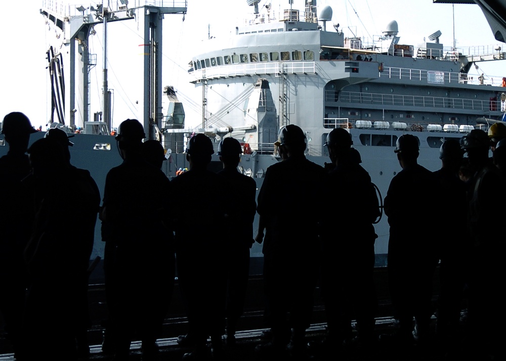 USS Eisenhower replenishes supplies