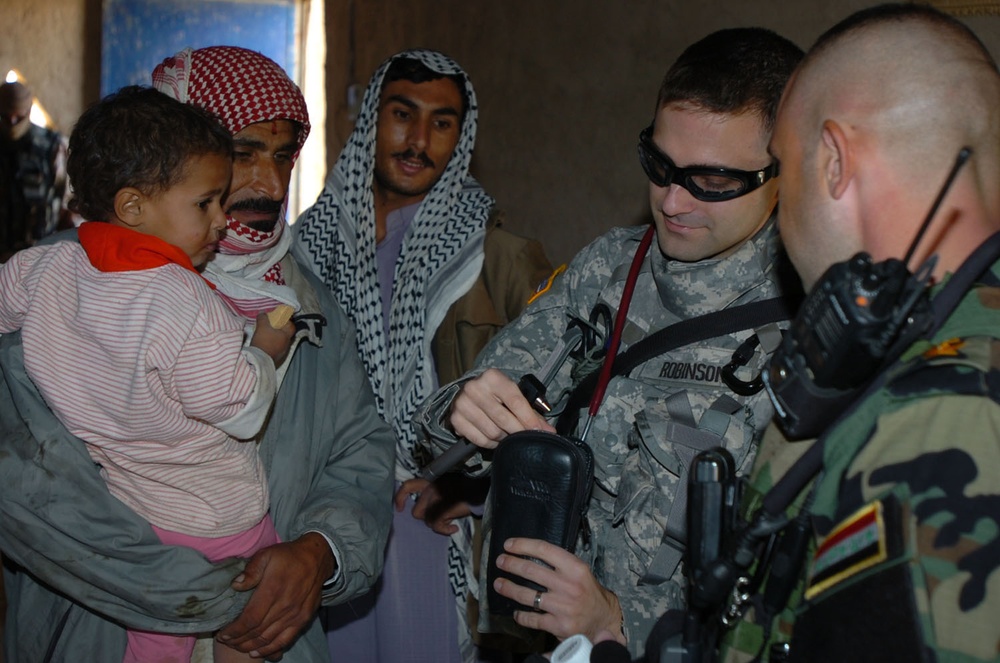 Airborne Soldiers Provide Medical Care to Tursak Citizens