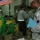 BALAD, Iraq (Nov. 11, 2006) - Master Sgt. Christopher Howard, the 13th Sustainment Command (Expeditionary) food service sergeant major, studies one of the displays at DFAC 4 as part of the Veterans Day DFAC competition Nov. 11. Howard was one of the two j