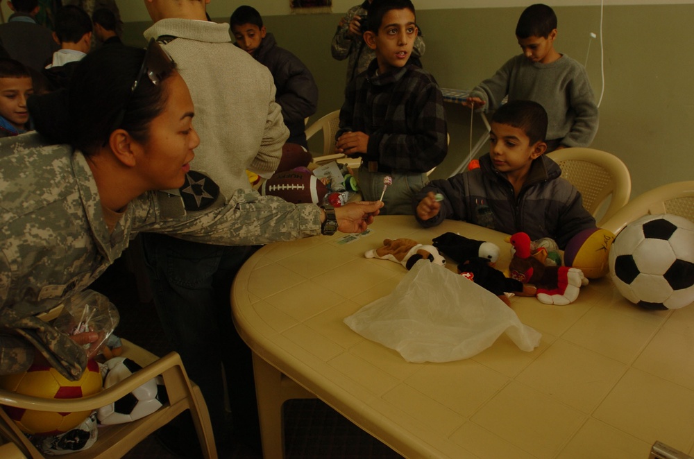 Soldiers visit St. Joseph's Catholic Orphanage