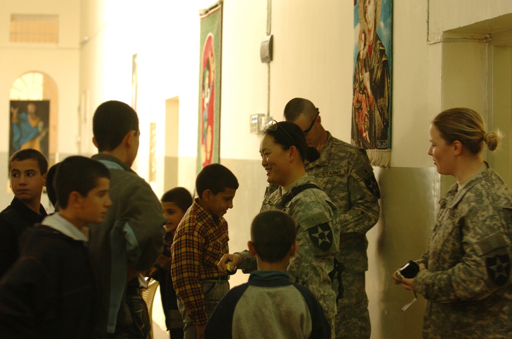 Soldiers visit St. Joseph's Catholic Orphanage