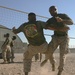 Doctors and corpsmen practice hand-to-hand combat