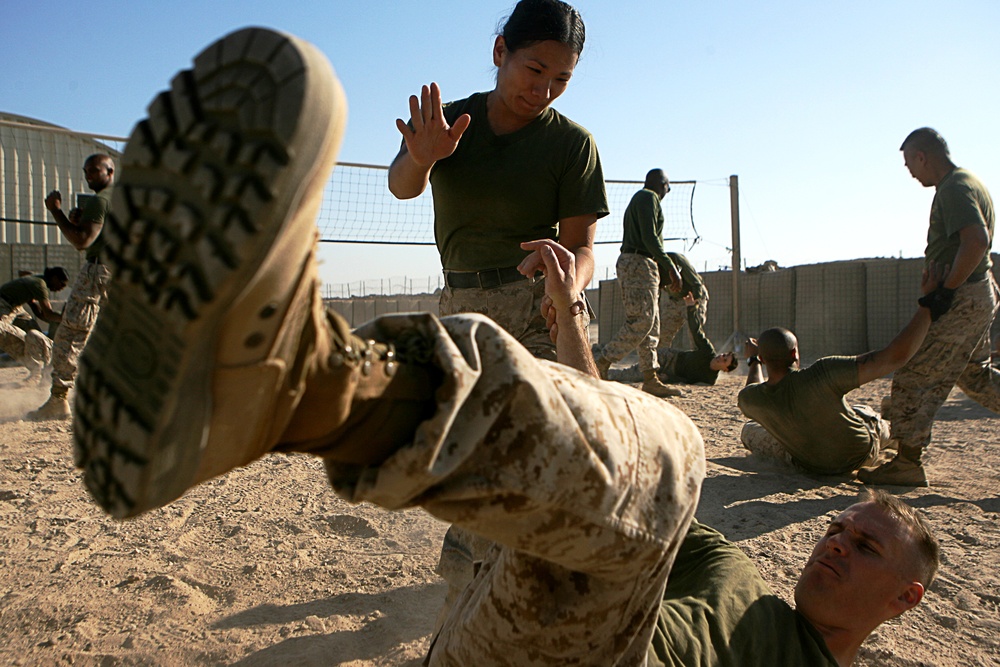 Doctors and corpsmen practice hand-to-hand combat