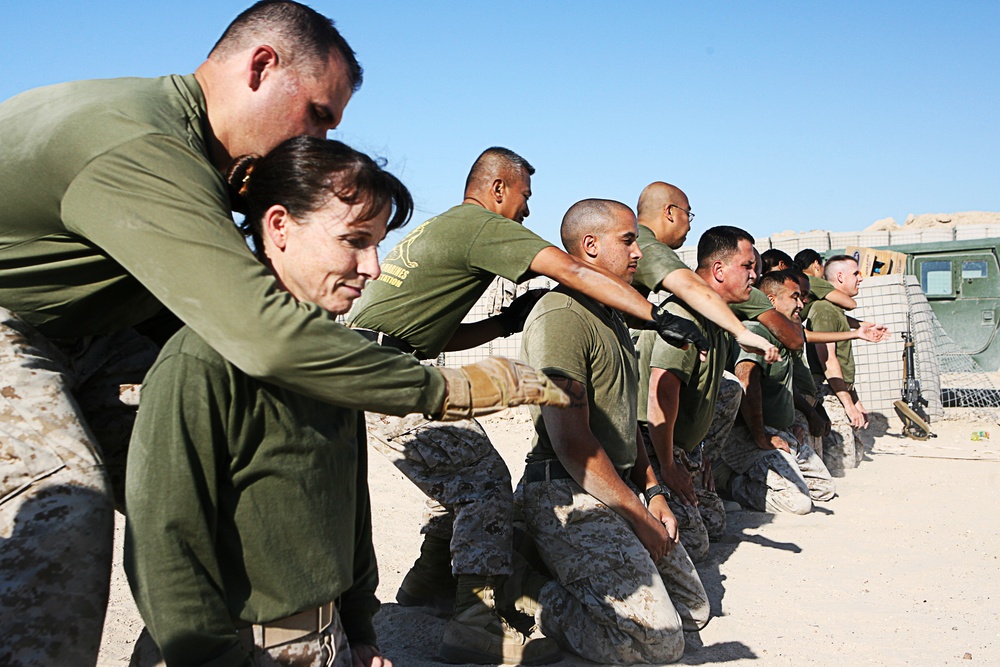 Doctors and corpsmen practice hand-to-hand combat