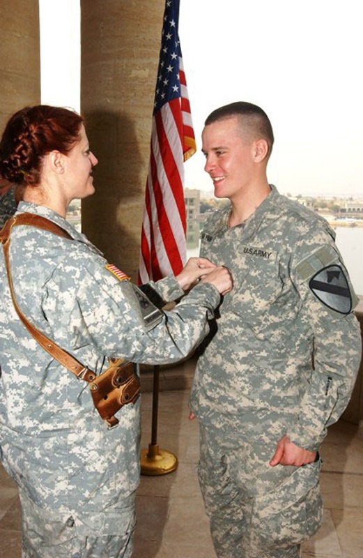 Mother, son reunion turns into double promotion ceremony