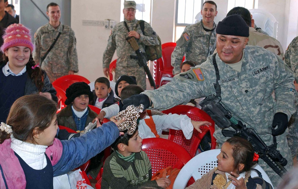 45th Sustainment Brigade Soldiers Open Hearts, Adopt Local Community
