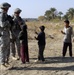 Paratroopers talk to children in Iskandariyah