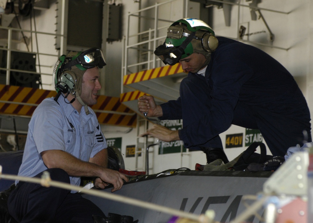 Mechanics Work on F-18 Super Hornet