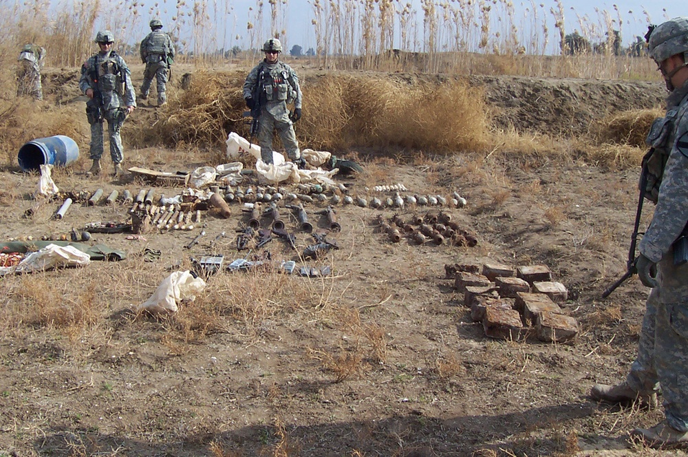 Troops Discover Seven Weapons Caches North of Iraqi Capital