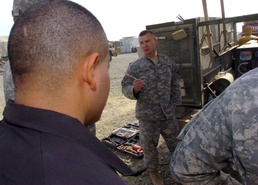 On the Road. 594th Transportation Company Keeping Heavy Trucks Moving North