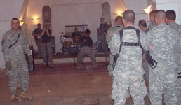 'First Team' Soldiers Entertained by 'Raw Material'