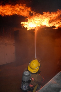 MCBJ firefighters take on Kadena's "burn house"