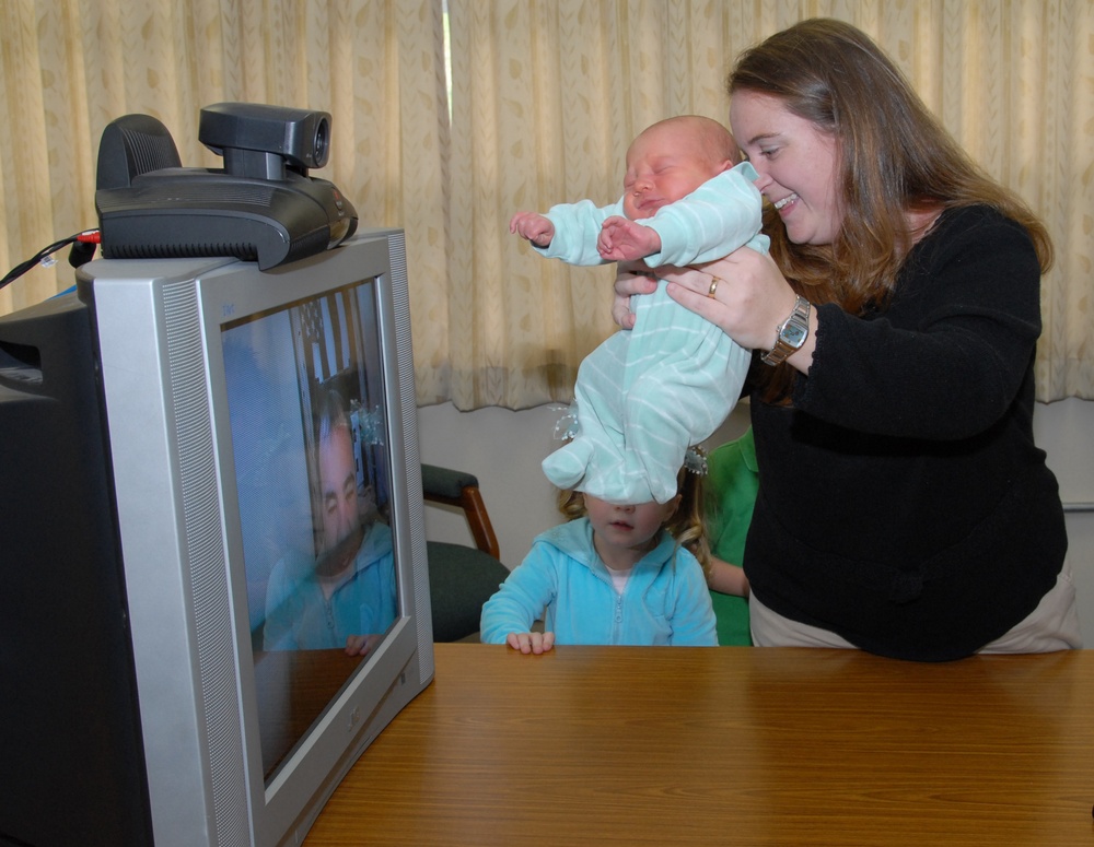 Military Families Reunited Via Satellite New Year's Day