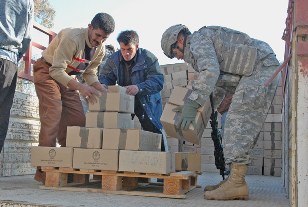 Soldiers Protect Medical Supply Delivery