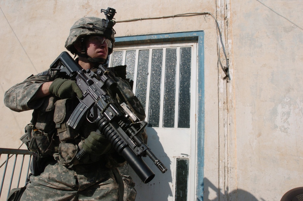 Strykers Sweep Neighborhood of Insurgency