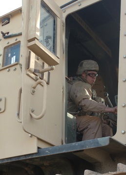 Soldiers Tear Down Past to Build the Future